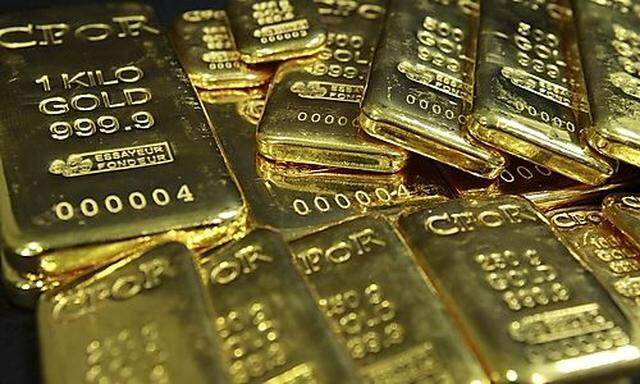 Gold bars weighing between 50 grams and 1 kilo are displayed in an office of French gold supplier CPo
