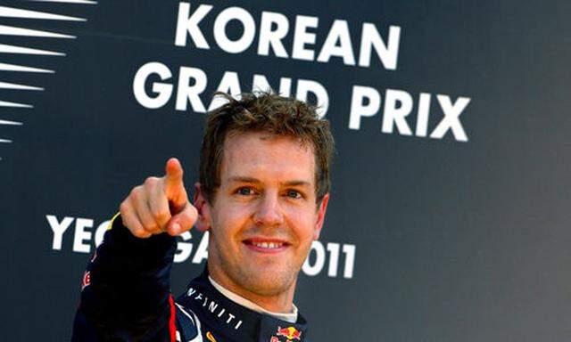 Ein gewohntes Bild - Sebastian Vettel auf dem Siegerpodest