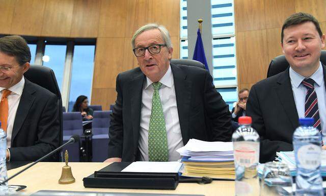 Kommissionsvorsitzender Juncker (l.) muss die Regierungen von seinen Euro-Plänen noch überzeugen.