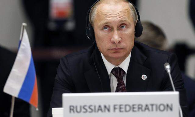 Russia´s President Putin attends the closing ceremony of Europe-Asia summit in Milan