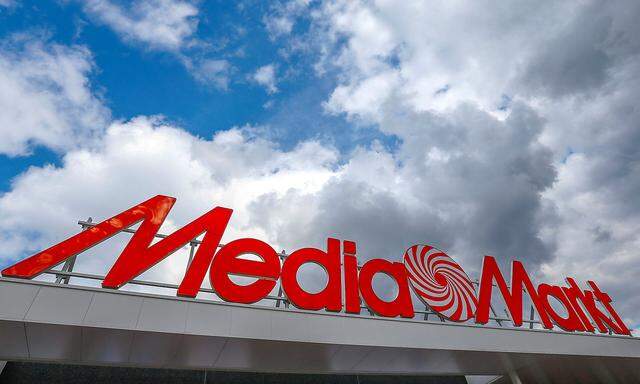 FILE PHOTO: The logo of the electronics retailer Media Markt is seen at the entrance of a shop in Sint-Pieters-Leeuw