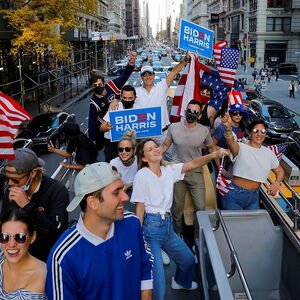 A group of friends who live in New York City celebrate after former Vice President Joe Biden was declared the winner of the 2020 U.S. presidential election