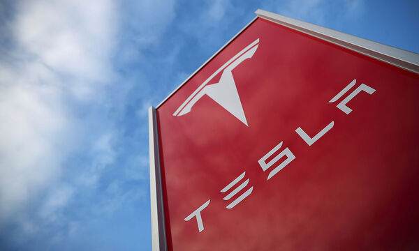 FILE PHOTO: A Tesla dealership is seen in West Drayton, just outside London