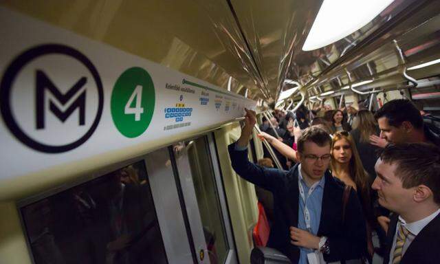 140328 BUDAPEST March 28 2014 Xinhua Passengers take the newly opened metro line 4 in Bu