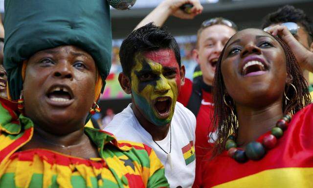 Fans of Ghana cheer before their 2014 World Cup Group G soccer match against Germany at the Castelao arena in Fortaleza