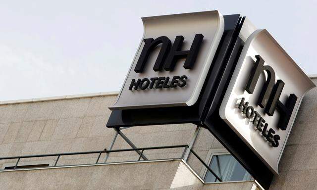 FILE PHOTO: The logo of Spanish NH Hoteles chain is seen on the roof of one of its hotel in central Madrid