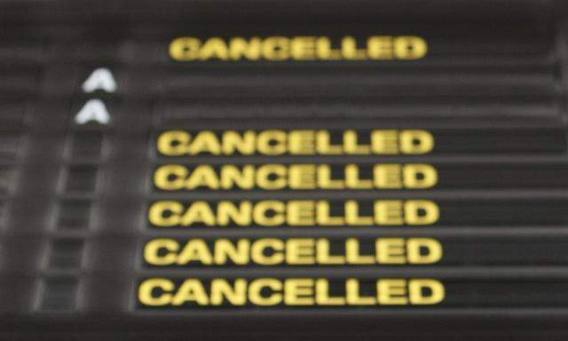 An information board shows all flights cancelled at the Zaventem international airport near Brussels