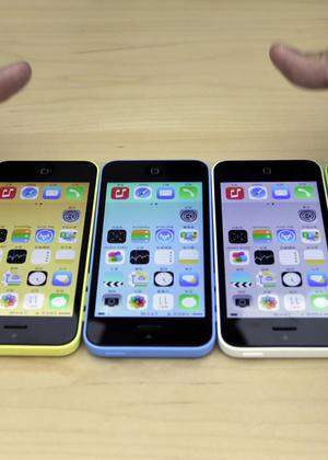 The new iPhone 5C in five colours are placed together at Apple Inc's announcement event in Beijing