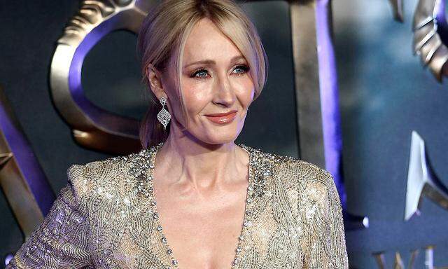 FILE PHOTO: Writer J.K. Rowling poses as she arrives for the European premiere of the film ´Fantastic Beasts and Where to Find Them´ at Cineworld Imax, Leicester Square in London