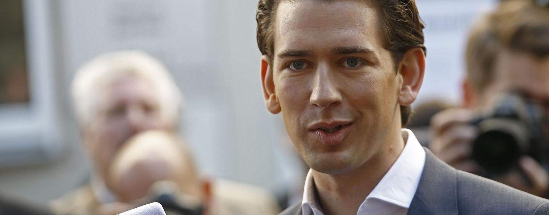 Top candidate of OeVP Kurz talks with journalist after leaving a polling station in Vienna