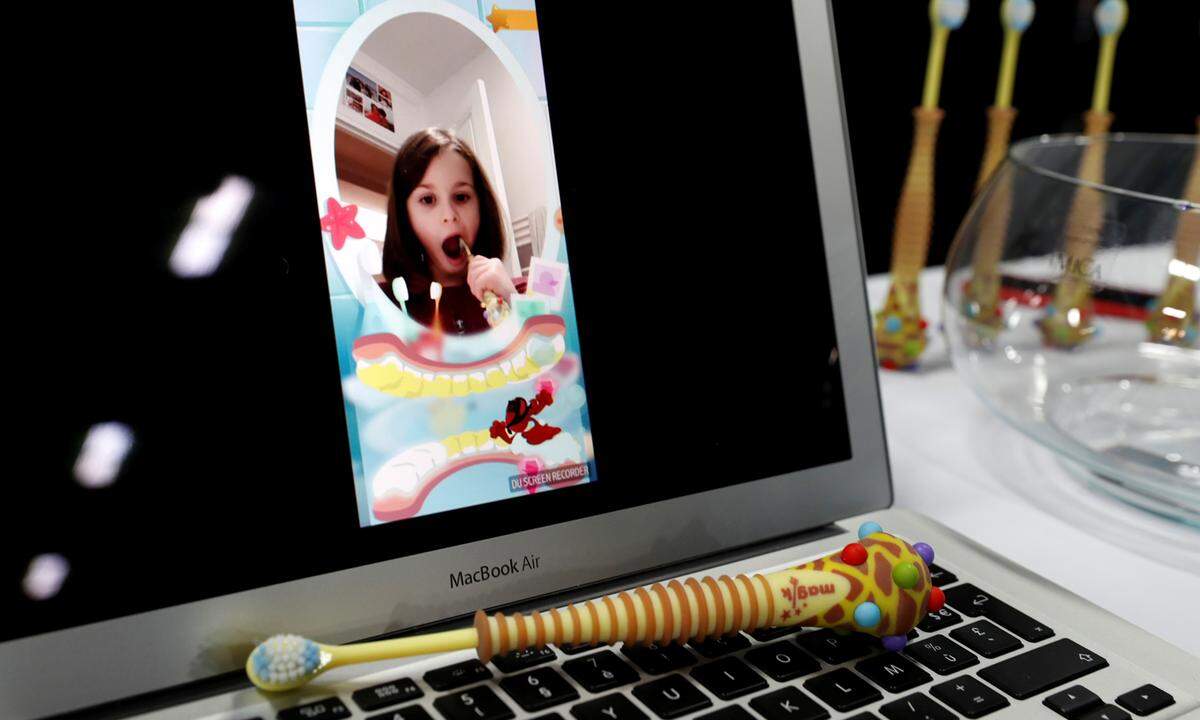 A Magik augmented reality toothbrush for children by Kolibree.