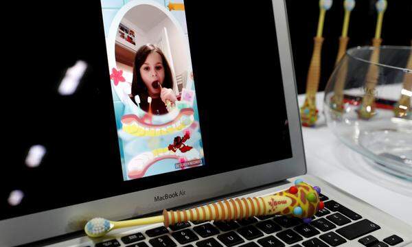 A Magik augmented reality toothbrush for children by Kolibree.