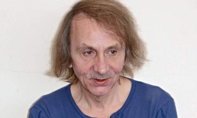 Michel Houellebecq attends a photocall in Venice during the Biennale mostra del Cinema Italy