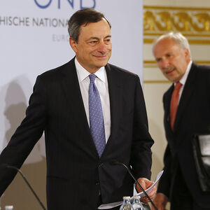 ECB President Draghi and ECB member Nowotny arrive for news conference in Vienna