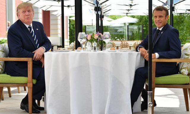 Donald Trump und Emmanuel Macron beim Mittagessen.