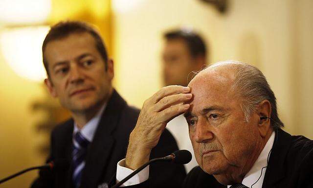 FIFA President Sepp Blatter reacts during a news conference in Jerusalem