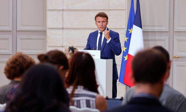 France's President Macron speaks to media after video talk with German Chancellor Scholz, in Paris