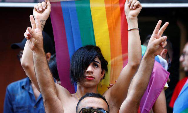 Members of LGBT community take part in a Gay Pride parade in central Istanbul