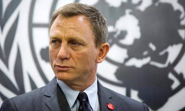 Daniel Craig listens to speakers at a service designating him as UN Global Advocate for Elimination of Mines and Explosive Hazards at the UN Headquarters in New York