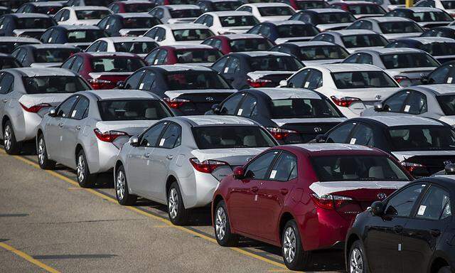 New cars are seen at the Toyota plant in Cambridge