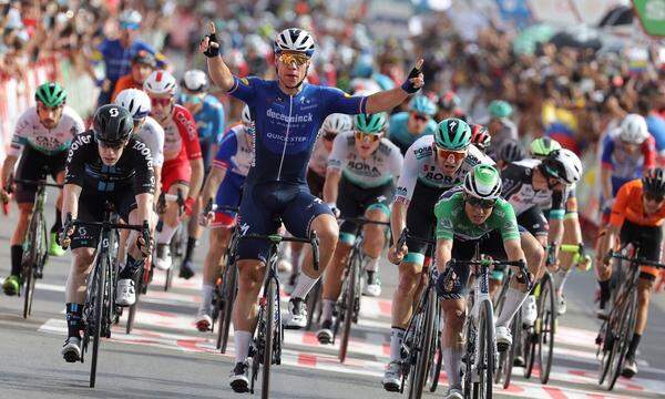 Dutch Fabio Jakobsen (C), of Deceuninck Quick Step team, celebrates after winning the 8th stage of the Spanish Cycling