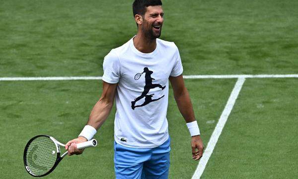 Serbia's Novak Djokovic reacts as he takes part in a training session at the All England Lawn Tennis Club in west London on June 27, 2023 the week before the Wimbledon Championships tennis tournament are due to start on July 3. (Photo by Ben Stansall / AFP)