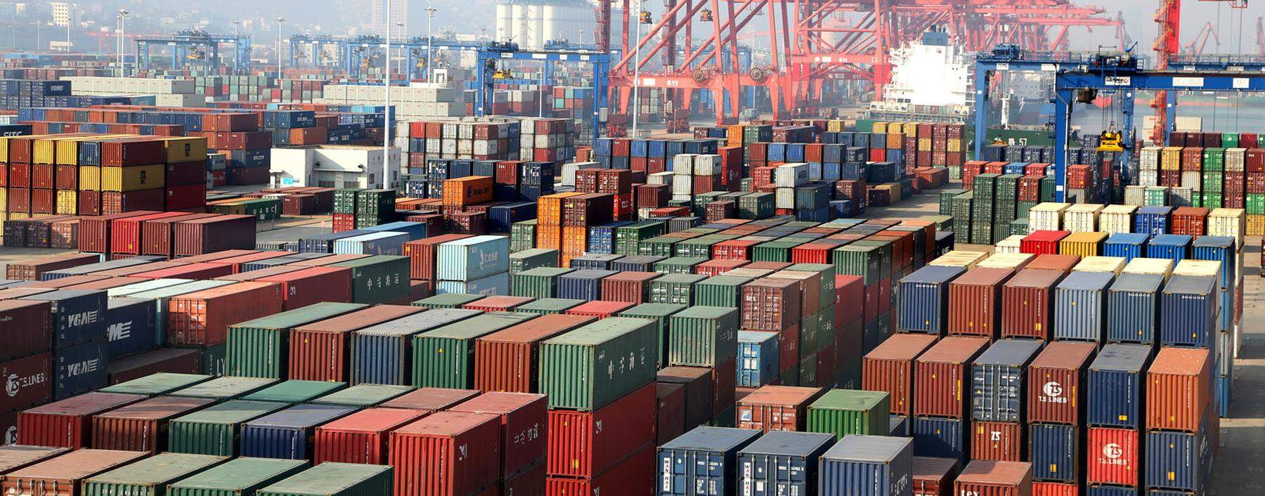 LIANYUNGANG, CHINA - DECEMBER 08: Shipping containers sit stacked at Lianyungang Port on December 8, 2019 in Lianyungan