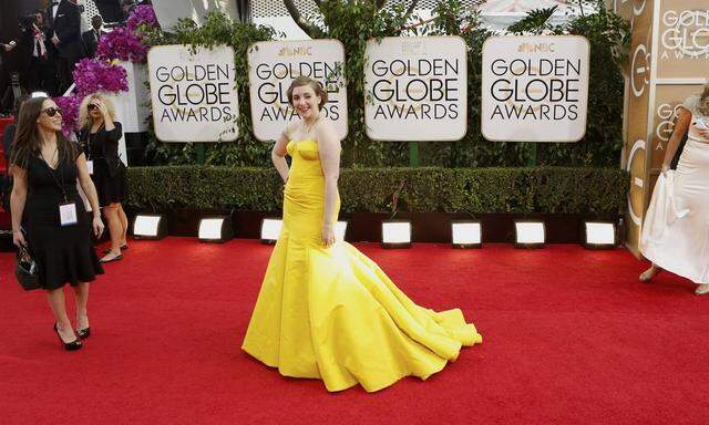 Actress Lena Dunham arrives at the 71st annual Golden Globe Awards in Beverly Hills