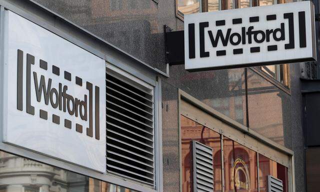 The logo of Austrian luxury textiles maker Wolford is seen outside a shop in the centre of Vienna