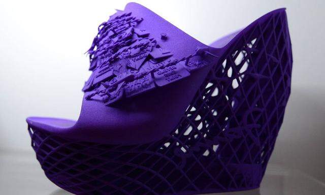 A shoe printed on a Cube 3D printer by 3D Systems is on display at the 2014 International CES a tra