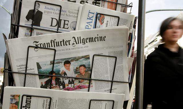 FILE PHOTO: A Frankfurter Allgemeine Zeitung and other papers are displayed for sale in front of a newspaper shop in Berli