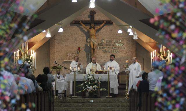 Priests celebrate mass at La Divina Providencia Chapel where the late Archbishop Oscar Arnulfo Romero was murdered in San Salvador