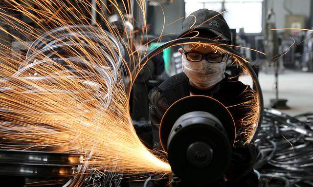 Symbolbild: Arbeiter in Hangzhou, Zhejiang