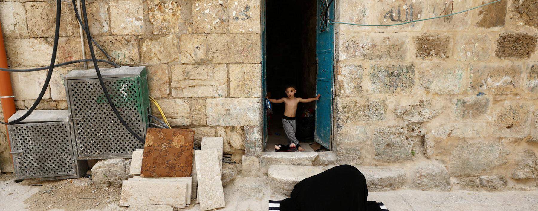 Eine Muslimin betet in Jerusalem. Israels Araber leiden unter wachsender Kriminalität.  