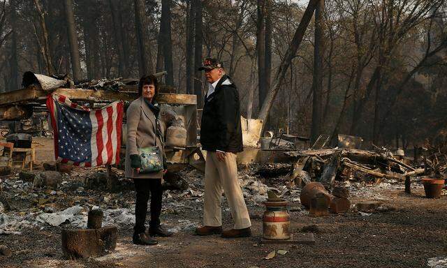 U.S. President Donald Trump visits the Skyway Villa Mobile Home and RV Park, a neighborhood destroyed by the camp fire with Mayor Jody Jones in Paradise