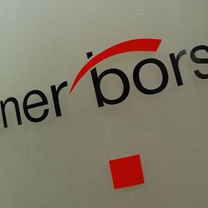 The Vienna Stock Exchange (Wiener Boerse) logo is displayed next to the company's street entrance in Vienna