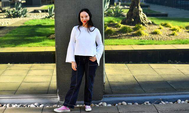 Soma Sara, the 22-year-old woman who started the 'Everyone's Invited' website stands for a portrait in London