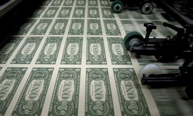 Operations At The Bureau Of Engraving And Printing As The $1 Bill Is Printed