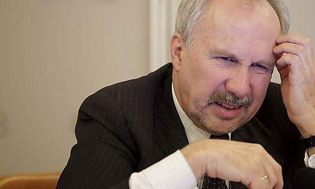 OeNB governor Ewald Nowotny reacts as he briefs the media during a news conference in Vienna