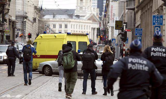 An ambulance believed to be carrying Salah Abdeslam, the most-wanted fugitive from November´s Paris attacks arrested yesterday, leaves the federal judicial police headquarters in Brussels