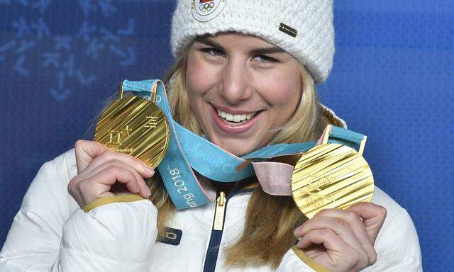 Snowboarder and skier Ester Ledecka 22 a double gold medalist won the gold medals in the Super G