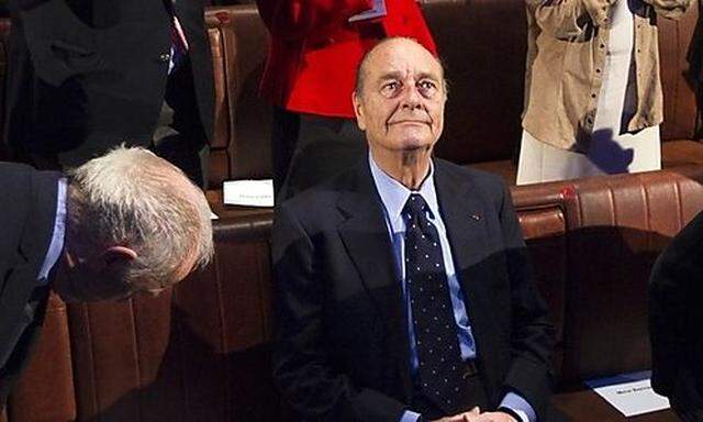 Former French President Jacques Chirac is applauded as he arrives at the awards ceremony for the Prix