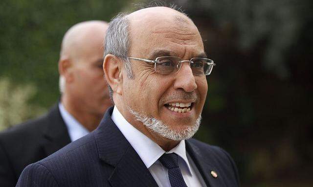 Tunisian Prime Minister Jebali he arrives for a round of consultations with other political parties at Carthage Palace in Tunis