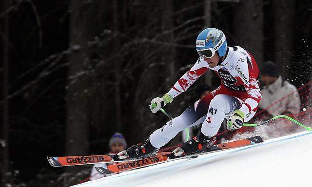 Striedinger of Austria takes a curve during the men's World Cup Downhill skiing race in Santa Caterina