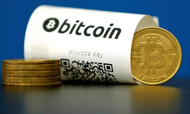 FILE PHOTO: An illustration photo shows a Bitcoin (virtual currency) paper wallet with QR codes and a coin