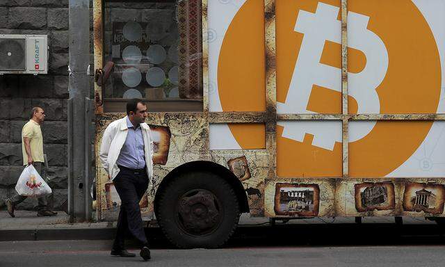 FILE PHOTO: A board with the logo of Bitcoin is on display in Yerevan