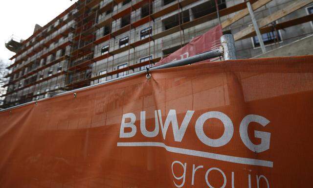 File photo of the logo of Austrian real estate agent BUWOG seen in front of one of their construction sites in Vienna