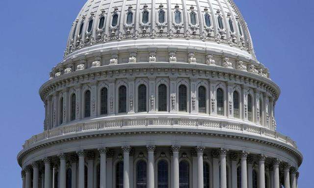 U.S. flag flies at half-staff on the Capitol dome in memory of former Senator Howard Baker in Washington