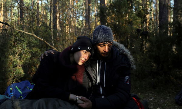 Syrian migrants in Lewosze after crossing the Belarusian-Polish border