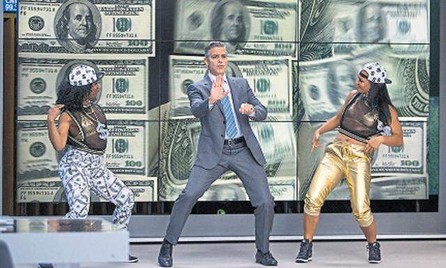 Hüftschwünge, für die sich seine Tanztutorin schämt: George Clooney als TV-Moderator, der mit Tänzchen auf seine dubiosen Anlagetipps einstimmt – bis ein durch sie Ruinierter die Sendung stürmt . . .